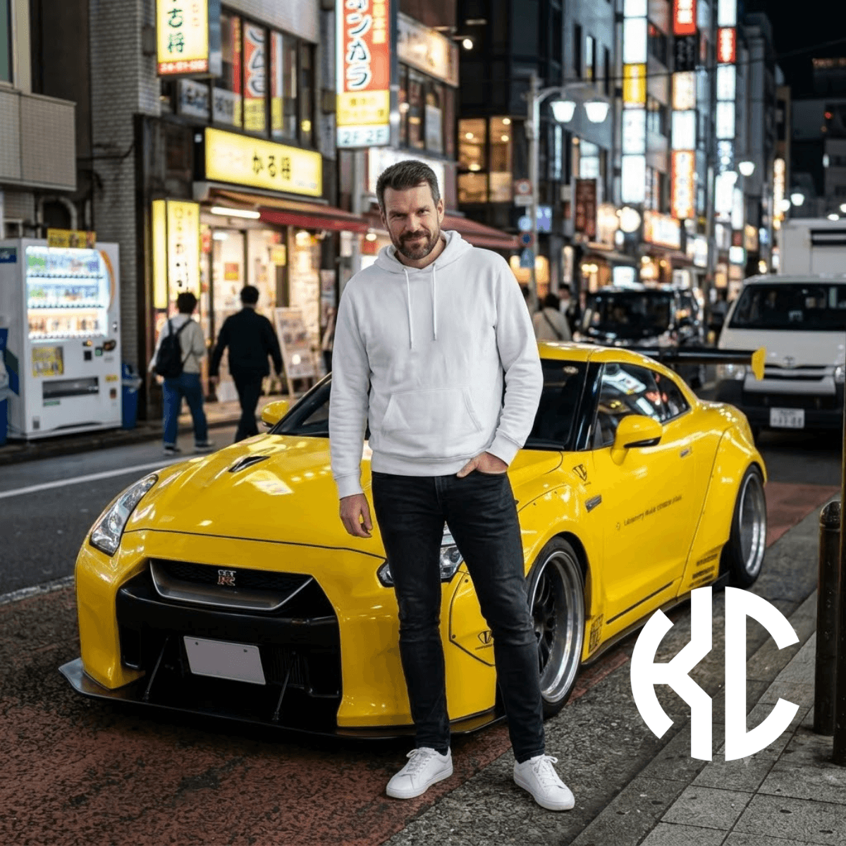 Karel standing in front of a yellow Nissan GTR R35 with Liberty Walk body kit